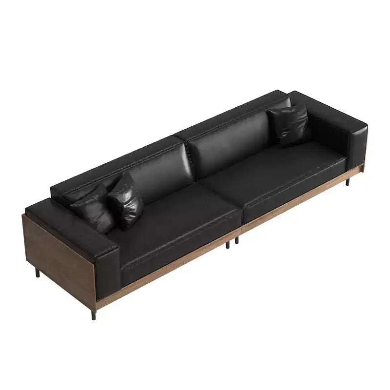 Divano moderno in pelle largo 270 cm con struttura in legno massello, gambe in metallo e 3 cuscini decorativi, nero