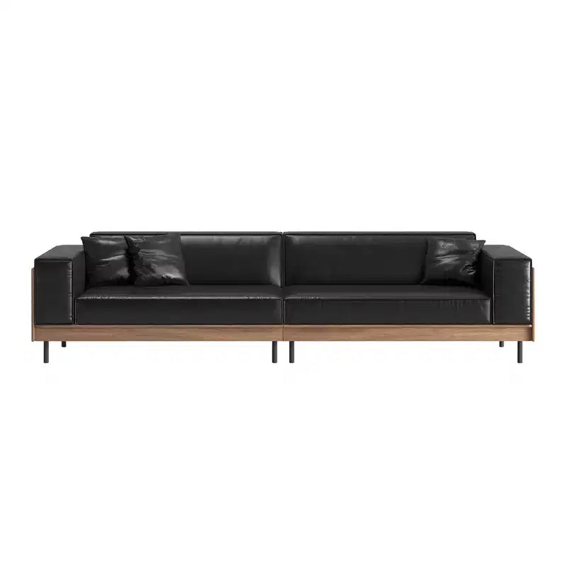 Divano moderno in pelle largo 270 cm con struttura in legno massello, gambe in metallo e 3 cuscini decorativi, nero